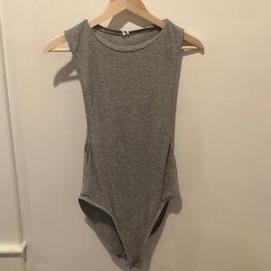 Grey bodysuit with low side slit
